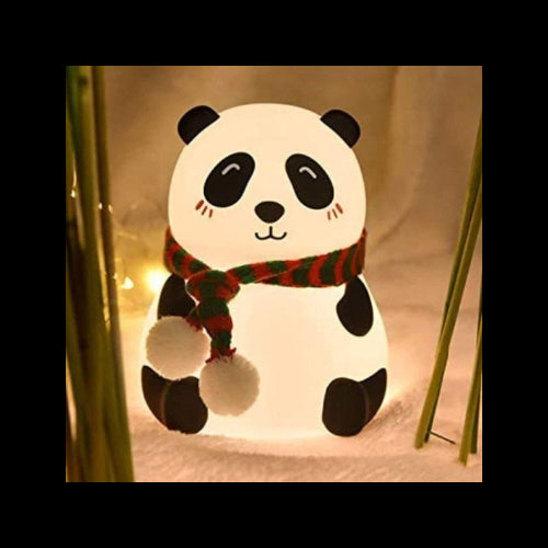 Panda-shaped night light with a scarf on a soft background